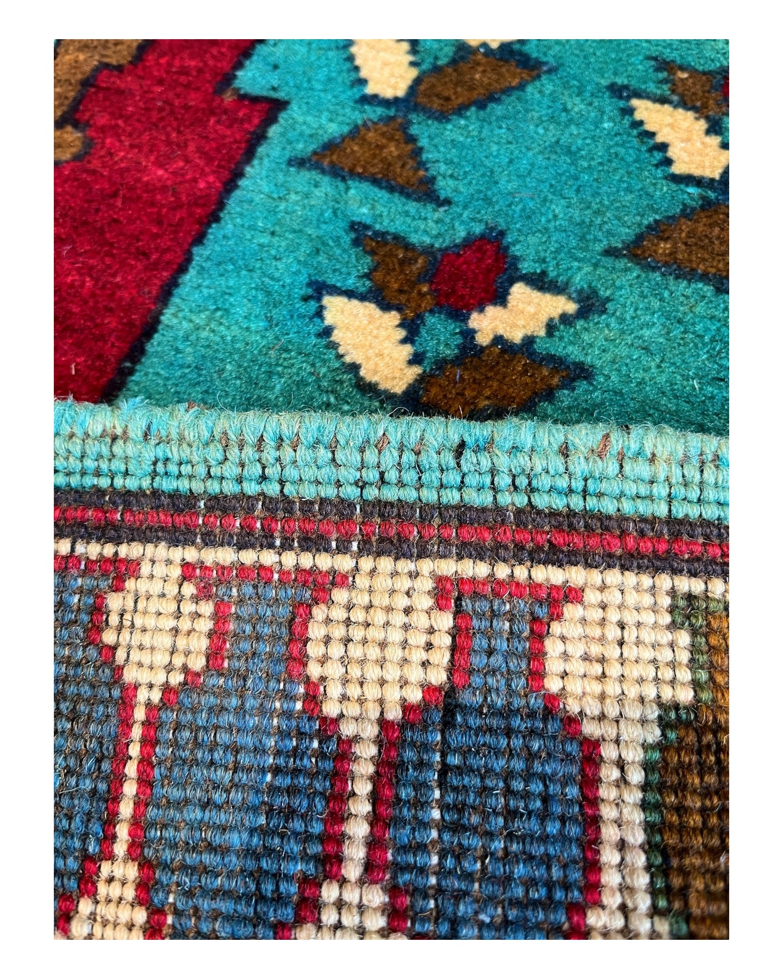 125cm x 82cm Turquoise & Red War Rug